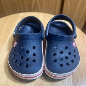 CROCS Kids Navy Blue Clogs with Red-Trim Sole